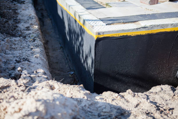 Professional Waterproofing technician working in Petersburg, KY